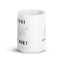 Load image into Gallery viewer, Real Love Doesn't Hurt White glossy mug